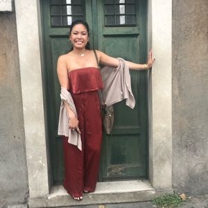 Rust colored sleeveless jumpsuit